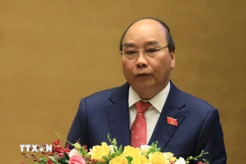 Thủ tướng Chính phủ Nguyễn Xuân Phúc trình bày Báo cáo kết quả thực hiện kế hoạch phát triển kinh tế-xã hội năm 2020 và 5 năm 2016-2020, dự kiến kế hoạch phát triển kinh tế-xã hội năm 2021, mục tiêu chủ yếu và một số nhiệm vụ, giải pháp phát triển kinh tế