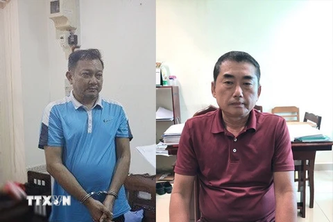 Hai bị cáo Lê Nguyễn Trần Huấn và Lâm Quế Mẫn. (Ảnh: TTXVN phát)