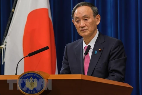 Thủ tướng Nhật Bản Suga Yoshihide tại cuộc họp báo về dịch COVID-19 tại Tokyo, Nhật Bản. (Ảnh: AFP/TTXVN)