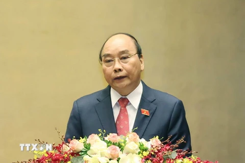Thủ tướng Nguyễn Xuân Phúc trình bày báo cáo tổng kết của Chính phủ nhiệm kỳ 2016-2021, sáng 24/3. (Ảnh: Thống Nhất/TTXVN)