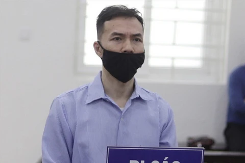 Bị cáo Lê Tuấn tại phiên tòa xét xử vụ án Lừa đảo chiếm đoạt tài sản. (Nguồn: laodong)