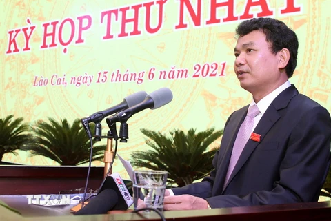 Ông Đặng Xuân Phong, Ủy viên Trung ương Đảng, Bí thư Tỉnh ủy Lào Cai phát biểu khai mạc kỳ họp. (Ảnh: Quốc Khánh/TTXVN)