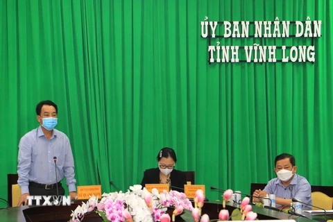 Chủ tịch UBND tỉnh Vĩnh Long Lữ Quang Ngời phát biểu tại cuộc họp Ban chỉ đạo phòng, chống dịch COVID-19 tỉnh ngày 22/6. (Ảnh: Lê Thúy Hằng/TTXVN)