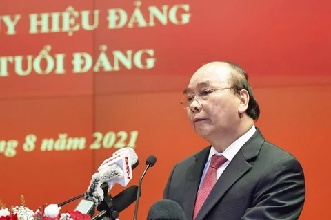 Chủ tịch nước Nguyễn Xuân Phúc phát biểu tại buổi gặp mặt. (Ảnh: Thống Nhất/TTXVN)
