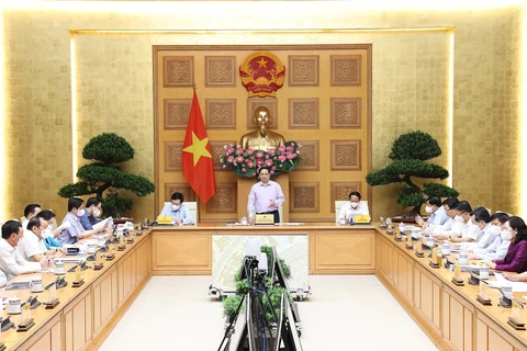 Thủ tướng Phạm Minh Chính chủ trì Hội nghị trực tuyến toàn quốc với các bộ, cơ quan Trung ương và địa phương về đẩy mạnh giải ngân kế hoạch vốn đầu tư công năm 2021, ngày 28/9 vừa qua. (Ảnh: Dương Giang/TTXVN)
