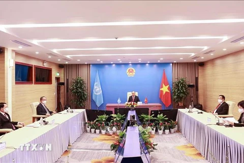 Chủ tịch nước Nguyễn Xuân Phúc phát biểu tại điểm cầu Hà Nội. (Ảnh: Thống Nhất/TTXVN)