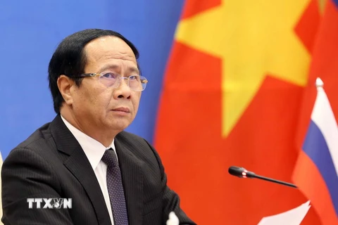 Phó Thủ tướng Chính phủ Lê Văn Thành, Chủ tịch Phân ban Việt Nam tham dự Khóa họp tại điểm cầu Hà Nội. (Ảnh: Phạm Kiên/TTXVN)