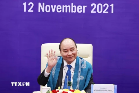 Chủ tịch nước Nguyễn Xuân Phúc dự Hội nghị các nhà Lãnh đạo kinh tế APEC lần thứ 28 được tổ chức theo hình thức trực tuyến. (Ảnh: Thống Nhất/TTXVN)