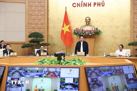 Thủ tướng Phạm Minh Chính chủ trì hội nghị triển khai Chương trình phục hồi và phát triển kinh tế-xã hội. (Ảnh: Dương Giang/TTXVN)
