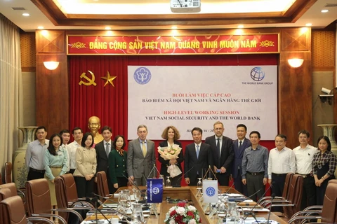 Lãnh đạo Tổng Giám đốc BHXH Việt Nam Nguyễn Thế Mạnh và làm việc với bà Carolyn Turk, Giám đốc WB tại Việt Nam cùng đoàn cán bộ cấp cao của WB. (Nguồn: vov.vn)