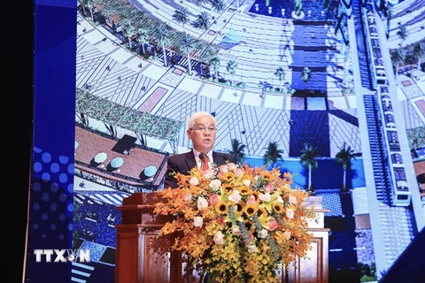Bí thư Tỉnh ủy Bình Dương Nguyễn Văn Lợi phát biểu tại Hội thảo. (Ảnh: Chí Tưởng/TTXVN)