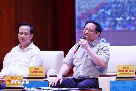 Thủ tướng Phạm Minh Chính đối thoại với công nhân lao động năm 2022. (Ảnh: Dương Giang/TTXVN)