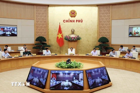 Phó Thủ tướng Lê Văn Thành phát biểu tại cuộc họp. (Ảnh: An Đăng/TTXVN)