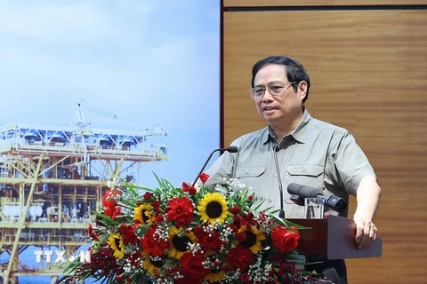Thủ tướng Phạm Minh Chính chủ trì buổi làm việc với Tập đoàn Dầu khí Quốc gia Việt Nam. (Ảnh: Dương Giang/TTXVN)
