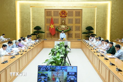 Phó Thủ tướng Thường trực Phạm Bình Minh chủ trì cuộc họp. (Ảnh: Minh Đức/TTXVN)