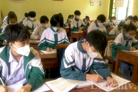 Học sinh đeo khẩu trang trong giờ học để đảm bảo phòng dịch. (Nguồn: Đài Phát thanh-Truyền hình Lào Cai)