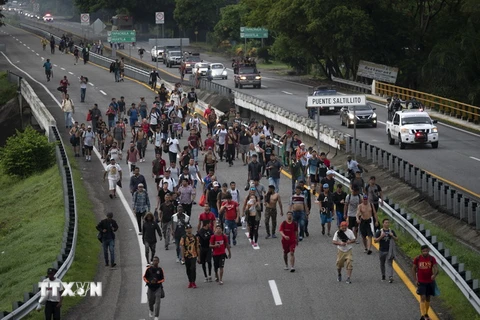 Người di cư trong hành trình tới Mỹ tại bang Chiapas, Mexico, ngày 9/6/2022. (Ảnh: AFP/TTXVN)