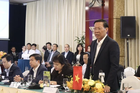 Ông Phan Văn Mãi, Chủ tịch UBND TP Hồ Chí Minh phát biểu tại hội nghị. (Ảnh: Xuân Anh/TTXVN)