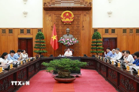 Phó Thủ tướng Trần Hồng Hà chủ trì buổi làm việc. (Ảnh: TTXVN)
