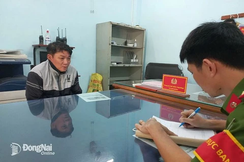 Đối tượng Phạm Ngọc Vinh tại Cơ quan Công an. (Nguồn: Báo Đồng Nai)