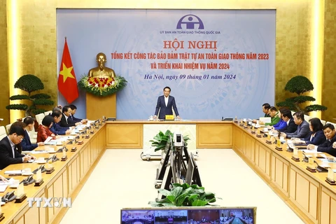 Phó Thủ tướng Trần Lưu Quang chủ trì Hội nghị tổng kết công tác đảm bảo trật tự an toàn giao thông năm 2023 và triển khai nhiệm vụ năm 2024. (Ảnh: Lâm Khánh/TTXVN)
