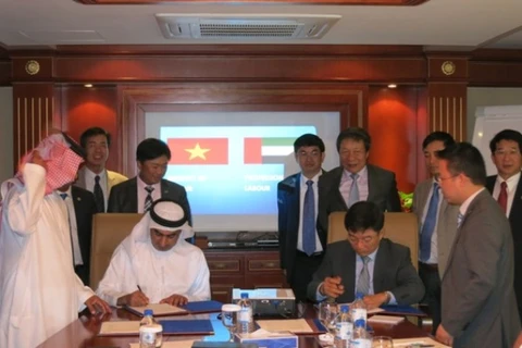 Việt Nam và UAE ký bản ghi nhớ tuyển dụng nhân lực năm 2014. (Ảnh: Dolab.gov.vn)