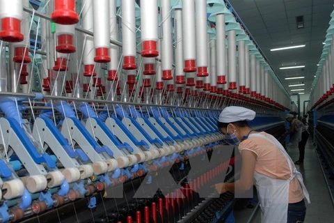 Ngành dệt là một trong những ngành sẽ gia tăng việc làm khi thực hiện Hiệp định EVFTA. (Ảnh minh hoạ: Danh Lam/TTXVN)