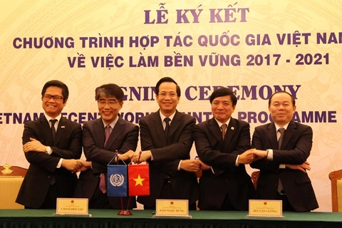 Lễ ký kết Chương trình hợp tác quốc gia Việt Nam-ILO về việc làm bền vững. (Ảnh: PV/Vietnam+)