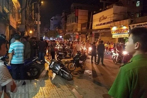 Hiện trường vụ cướp khiến hai "hiệp sỹ" hy sinh tại Thành phố Hồ Chí Minh. (Nguồn: TTXVN)