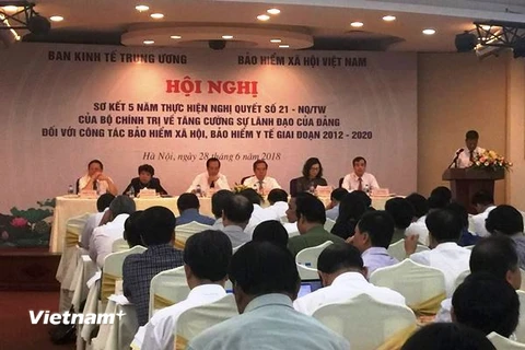  Hội nghị sơ kết 5 năm thực hiện Nghị quyết số 21-NQ/TW về tăng cường sự lãnh đạo của Đảng đối với công tác bảo hiểm xã hội, bảo hiểm y tế. (Ảnh: PV/Vietnam+)