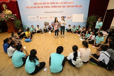 Trẻ em thảo luận về các vấn đề phòng, chống bạo lực, xâm hại trẻ em tại Diễn đàn trẻ em quốc gia. (Ảnh minh hoạ: Anh Tuấn/TTXVN)