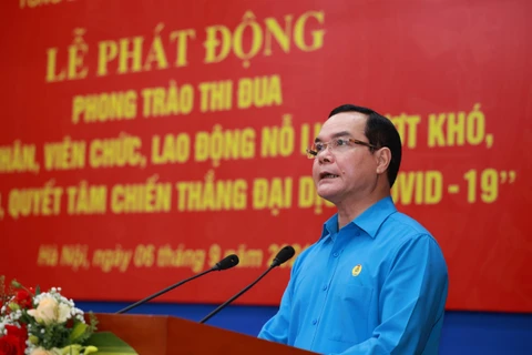 Chủ tịch Tổng Liên đoàn Lao động Việt Nam Nguyễn Đình Khang kêu gọi “mỗi công đoàn cơ sở là một pháo đài, là mái nhà bình yên”. (Ảnh: PV/Vietnam+)