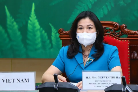 Thứ trưởng Bộ Lao động-Thương binh và Xã hội Nguyễn Thị Hà phát biểu tại diễn đàn. (Ảnh: PV/Vietnam+)
