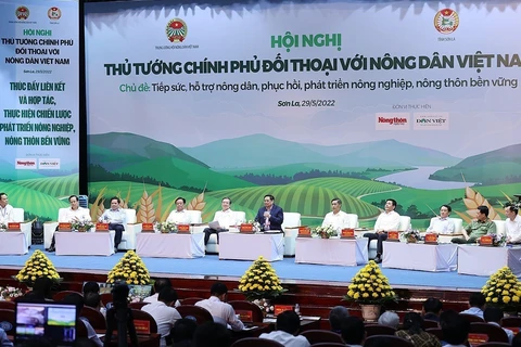 Thủ tướng Chính phủ Phạm Minh Chính đối thoại với nông dân Việt Nam năm 2022. (Ảnh: Dương Giang: TTXVN)