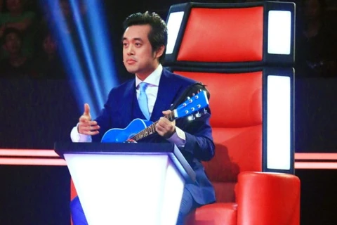 Nhạc sỹ Dương Khắc Linh trên 'ghế nóng' của 'Giọng hát Việt nhí 2015.' (Ảnh: BTC)