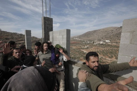 Israel bác bỏ dự luật sáp nhập khu định cư ở Bờ Tây
