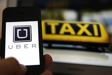Uber sẽ sáp nhập đơn vị Uber China với Didi (Nguồn: Bloomberg)