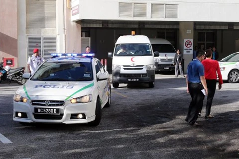 Xe chở thi thể ông Kim Jong-nam rời bệnh viện Putrajaya. (Nguồn: New Straits Times)