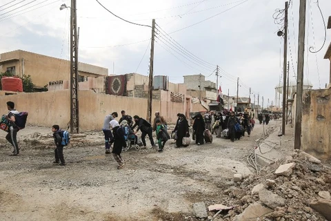 Thường dân Iraq sơ tán khỏi Mosul. (Nguồn: AFP) 