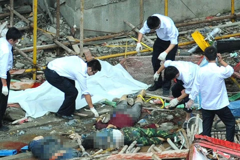 Vụ tai nạn thang máy ở Vũ Hán (Trung Quốc) làm 19 người thiệt mạng hồi tháng 9/2012. (Ảnh: english.caixin.com)