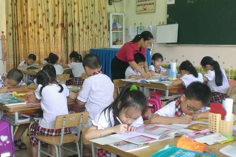 Giờ học theo mô hình trường tiểu học mới của cô và trò trường Tiểu học Hoàng Văn Thụ, Lào Cai. (Ảnh: PM/Vietnam+)