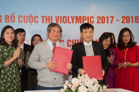 Đại diện FPT và Viện Khoa học Giáo dục Việt Nam ký kết thỏa thuận hợp tác. (Ảnh: FPT)