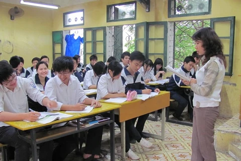 Những áp lực sổ sách ảnh hưởng đến hoạt động chuyên môn của giáo viên. (Ảnh minh họa: PM/Vietnam+)