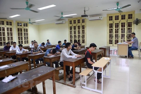 Thí sinh dự thi Trung học phổ thông quốc gia . (Ảnh: Minh Sơn/Vietnam+)