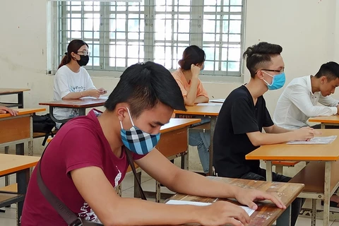 Học sinh Hà Nội dự thi tốt nghiệp trung học phổ thông năm 2020. (Ảnh: Phạm Mai/Vietnam+)