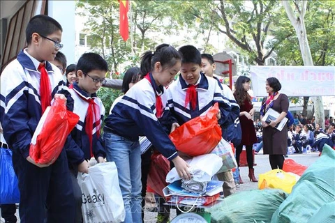 Học sinh thực hiện phong trào kế hoạch nhỏ. (Ảnh: TTXVN)