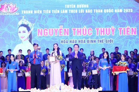 Hoa hậu Nguyễn Trúc Thùy Tiên là một trong 420 gương mặt được vinh danh. (Ảnh: Minh Đức/TTXVN) 