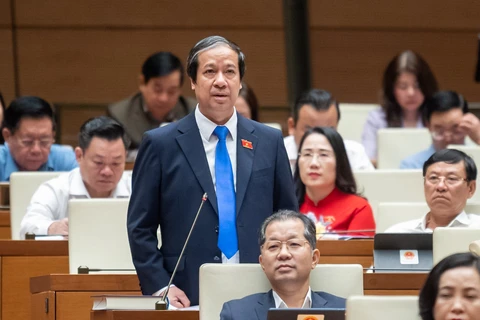 Bộ trưởng Nguyễn Kim Sơn trả lời chất vấn trước Quốc hội. (Ảnh: CTV/Vietnam+)