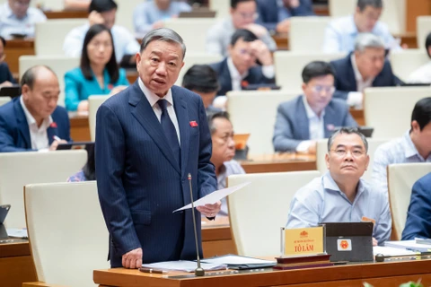Bộ trưởng Bộ Công an Tô Lâm trả lời chất vấn. (Ảnh: CTV/Vietnam+)