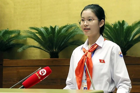 Em Đặng Cát Tiên trong vai trò Chủ tịch Quốc hội tại phiên họp giả định Quốc hội trẻ em lần I năm 2023. (Ảnh: PV/Vietnam+)
